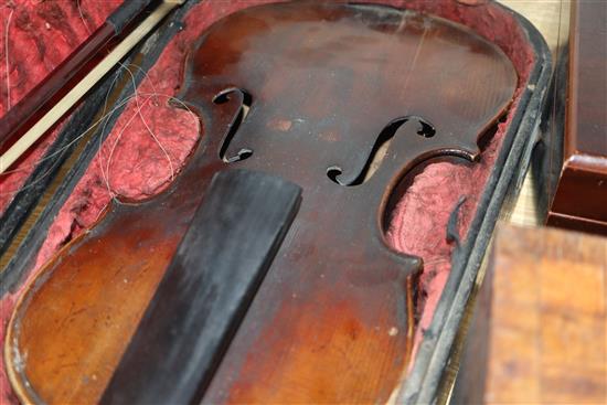 A late 19th century German violin, bears Stradivarius label, cased with bow, back 36cm